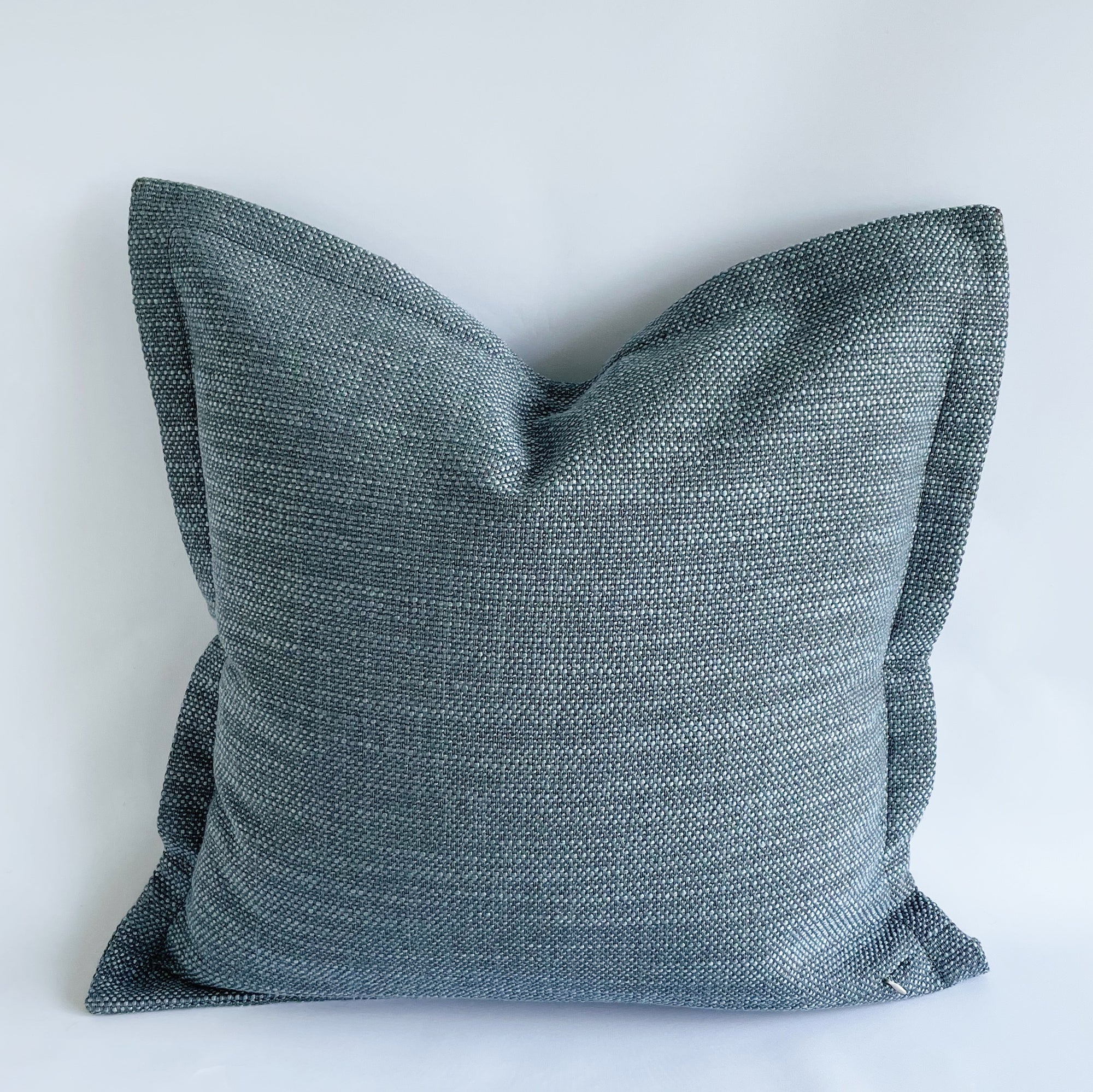 SquareFox textured blue cushion with flange edge Peyton Cloud